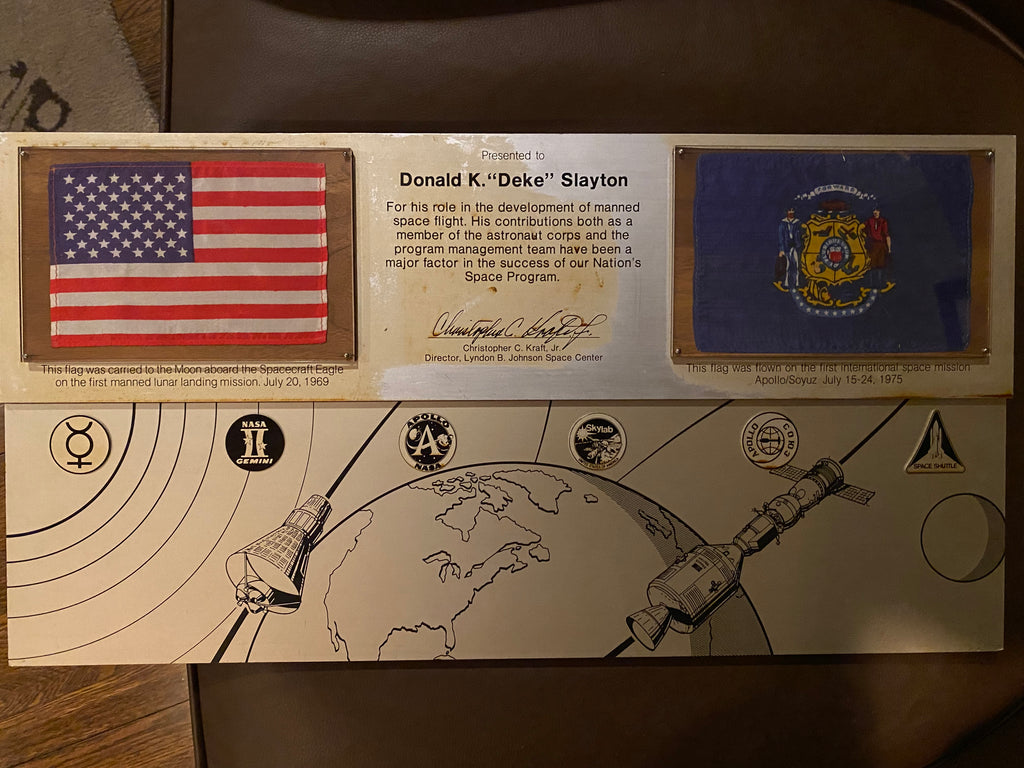 Deke Slayton flown to the surface Apollo 11 flag and flown Apollo/Soyuz State flag